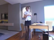 Chinese model black silk uniform secretary in the hotel